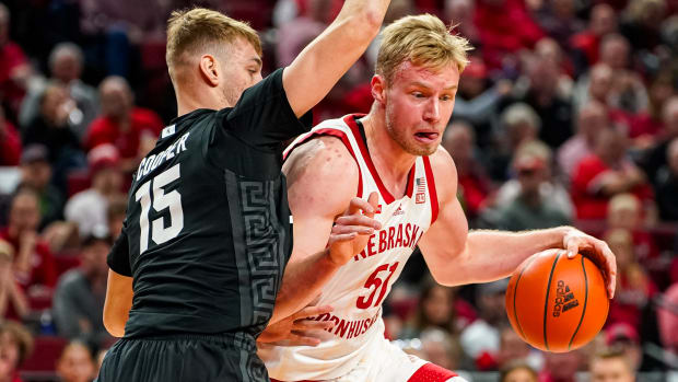 Nebraska forward Rienk Mast drives against Michigan State center Carson Cooper during the first half at Pinnacle Bank Arena. (Dec 10, 2023)